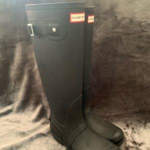 Tall black Hunter rain boots